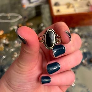 Black stone silver ring.